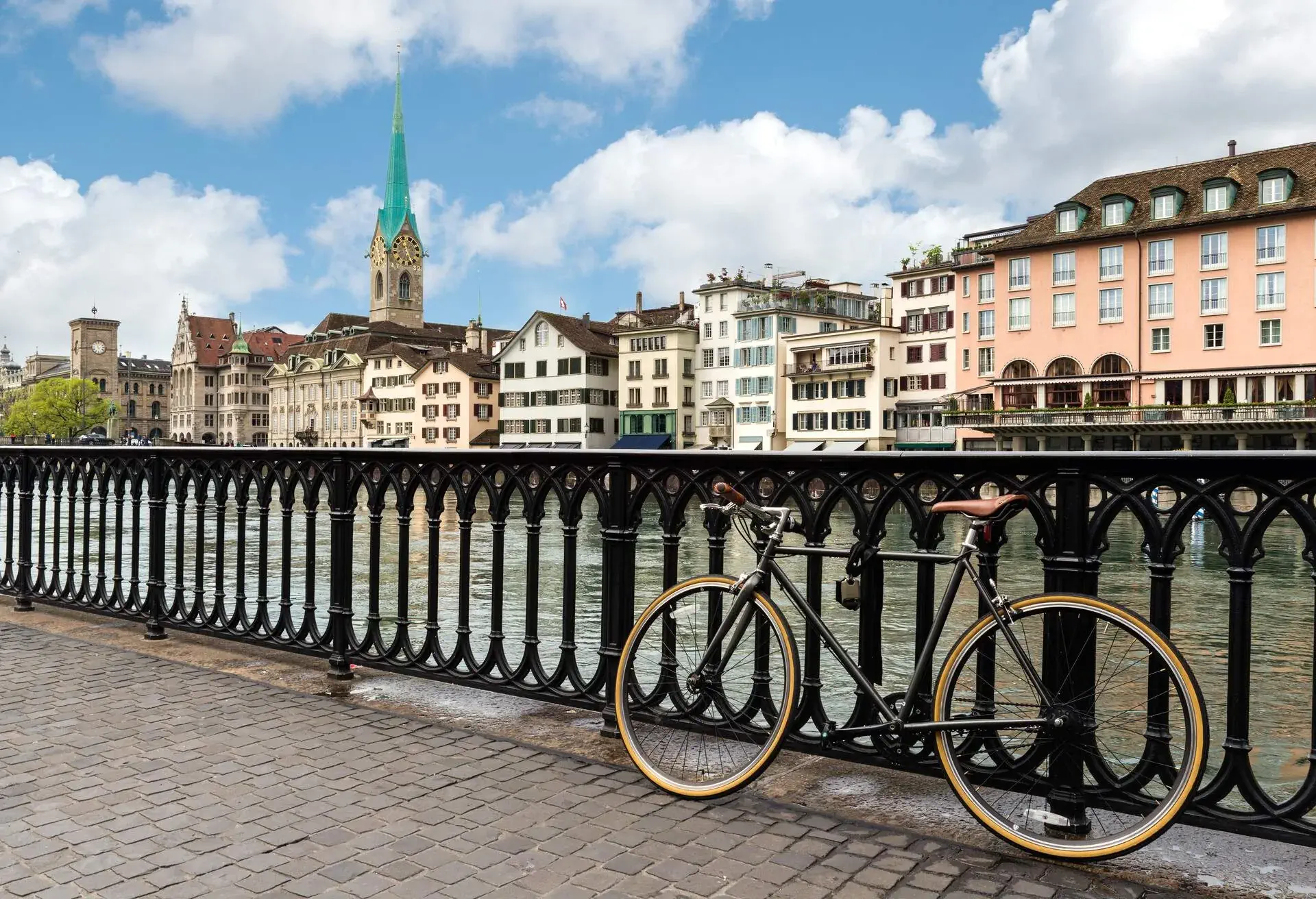 View of Zurich on Fraumunster Church and Church of St. Peter with bicycle in Zurich, Switzerland.