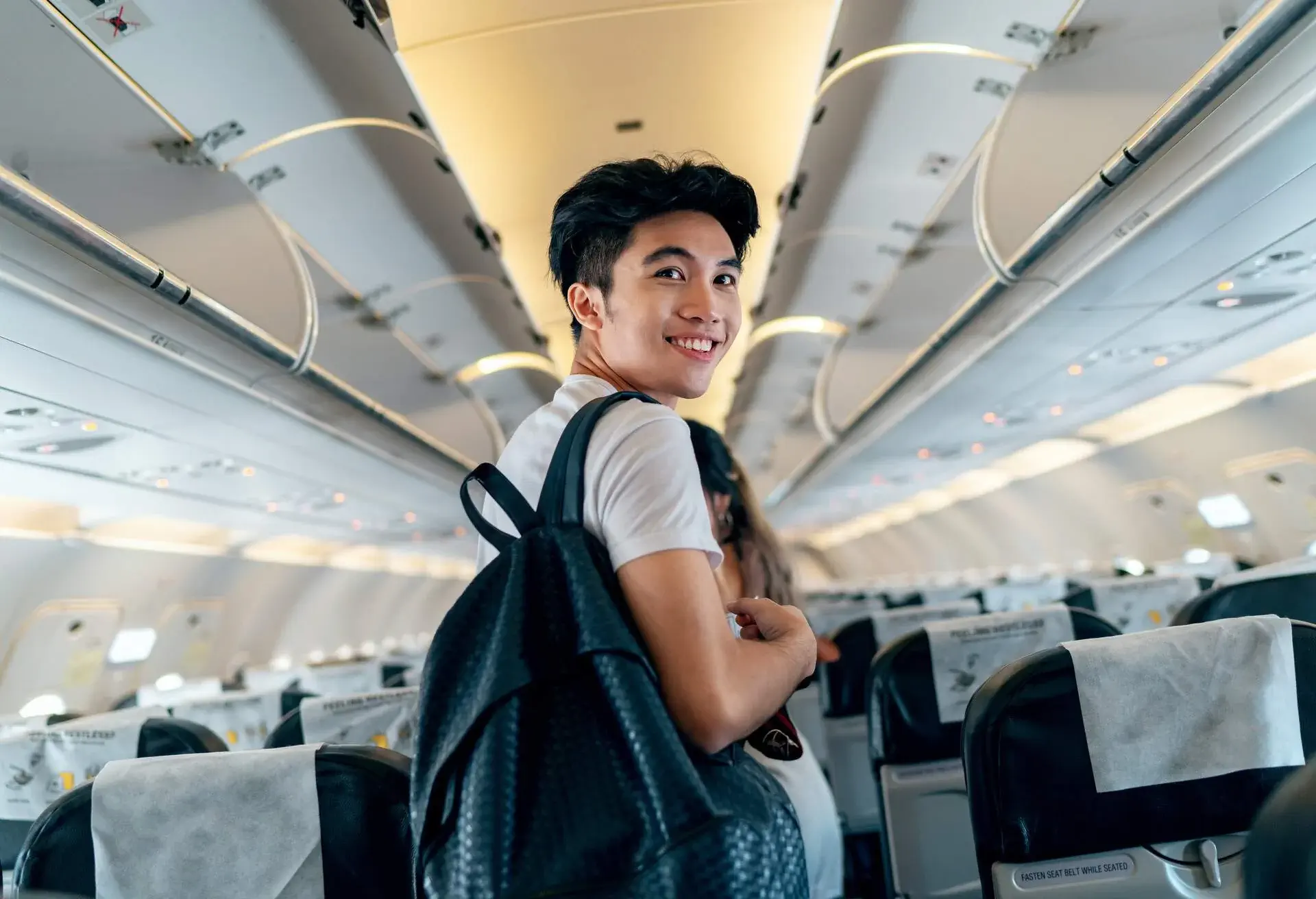 people_man_airplane_aisle