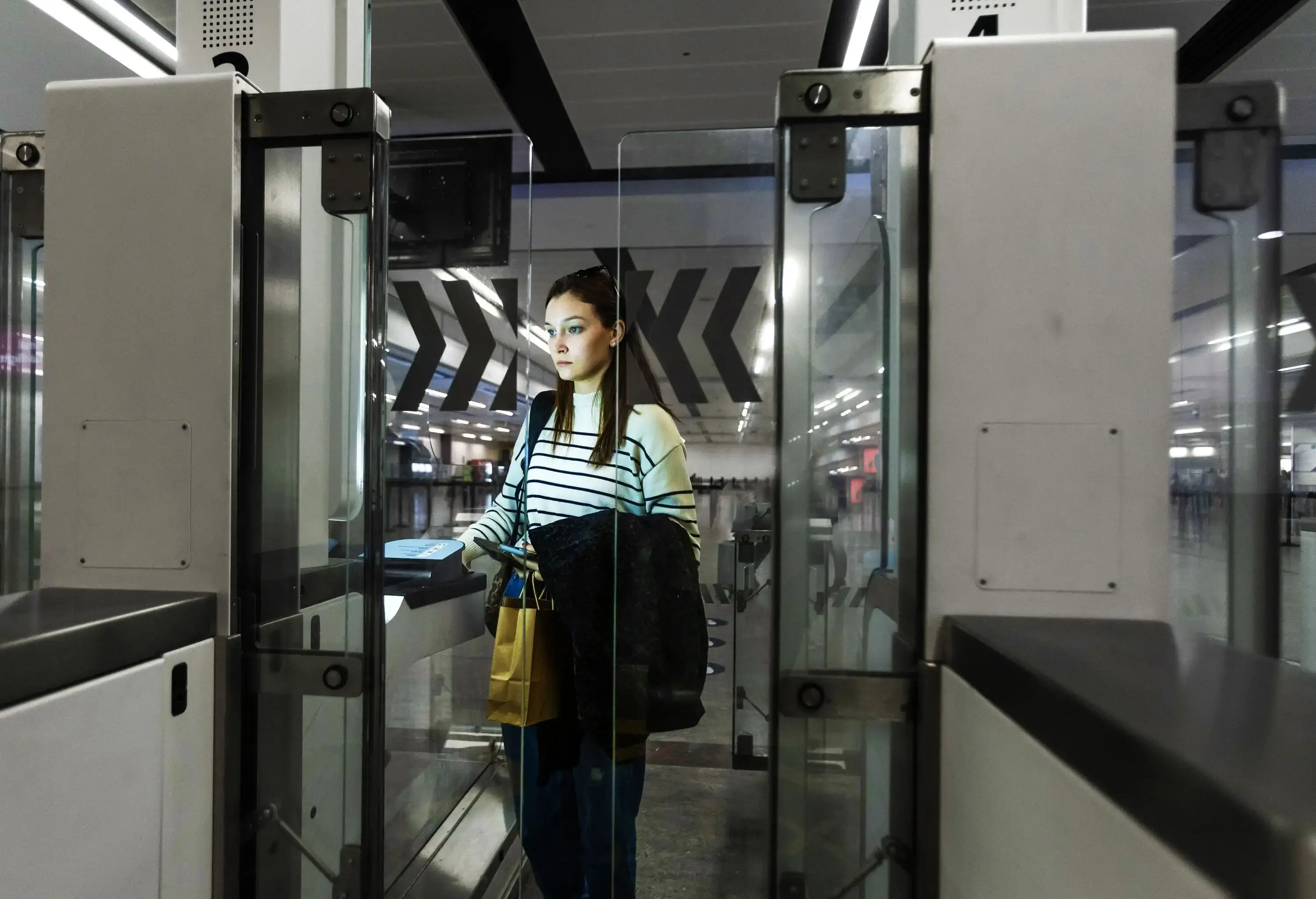 Women passing arrival Immigration Passport Control Point