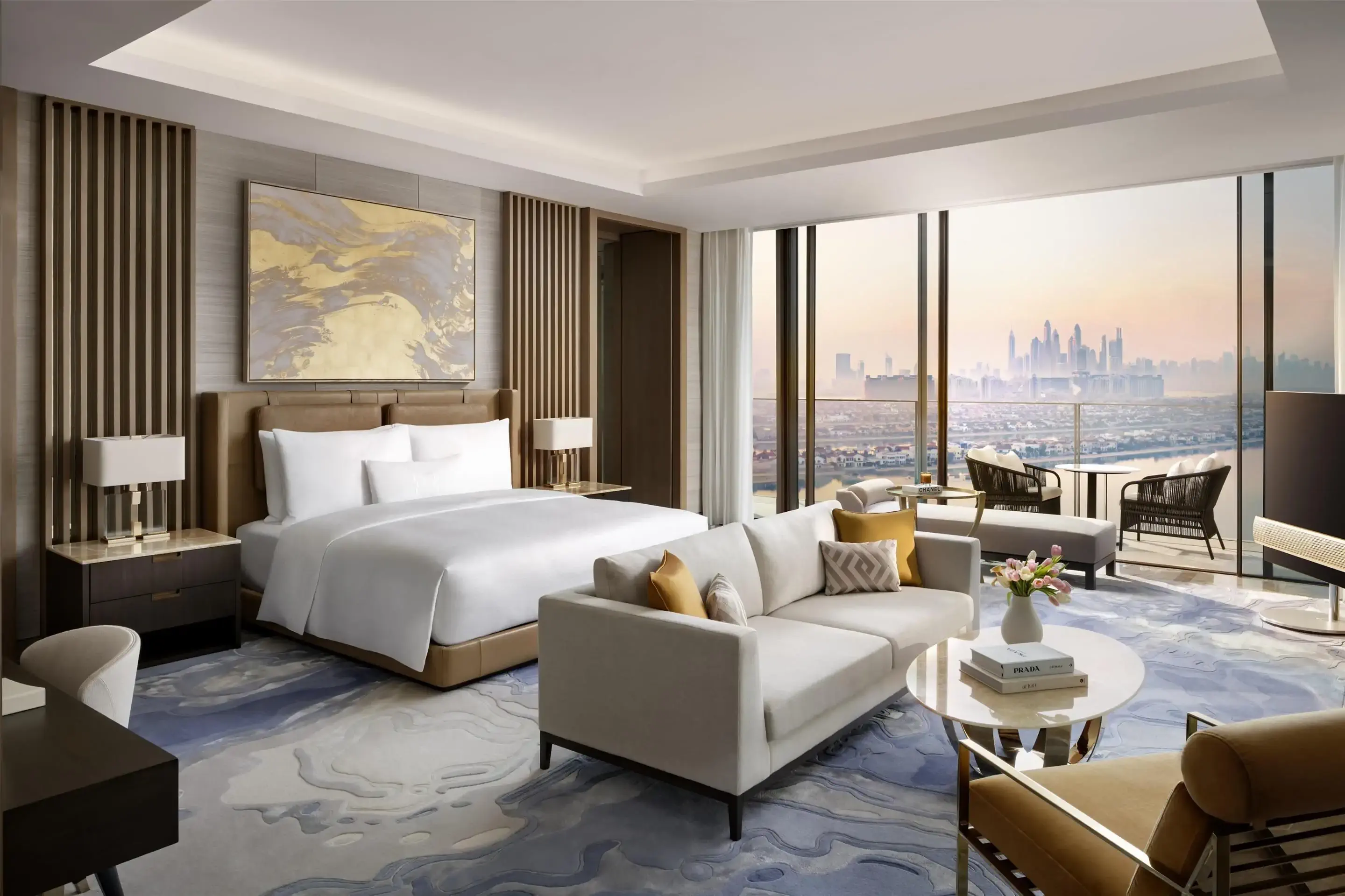 Luxury hotel suite with view over sprawling city by the sea