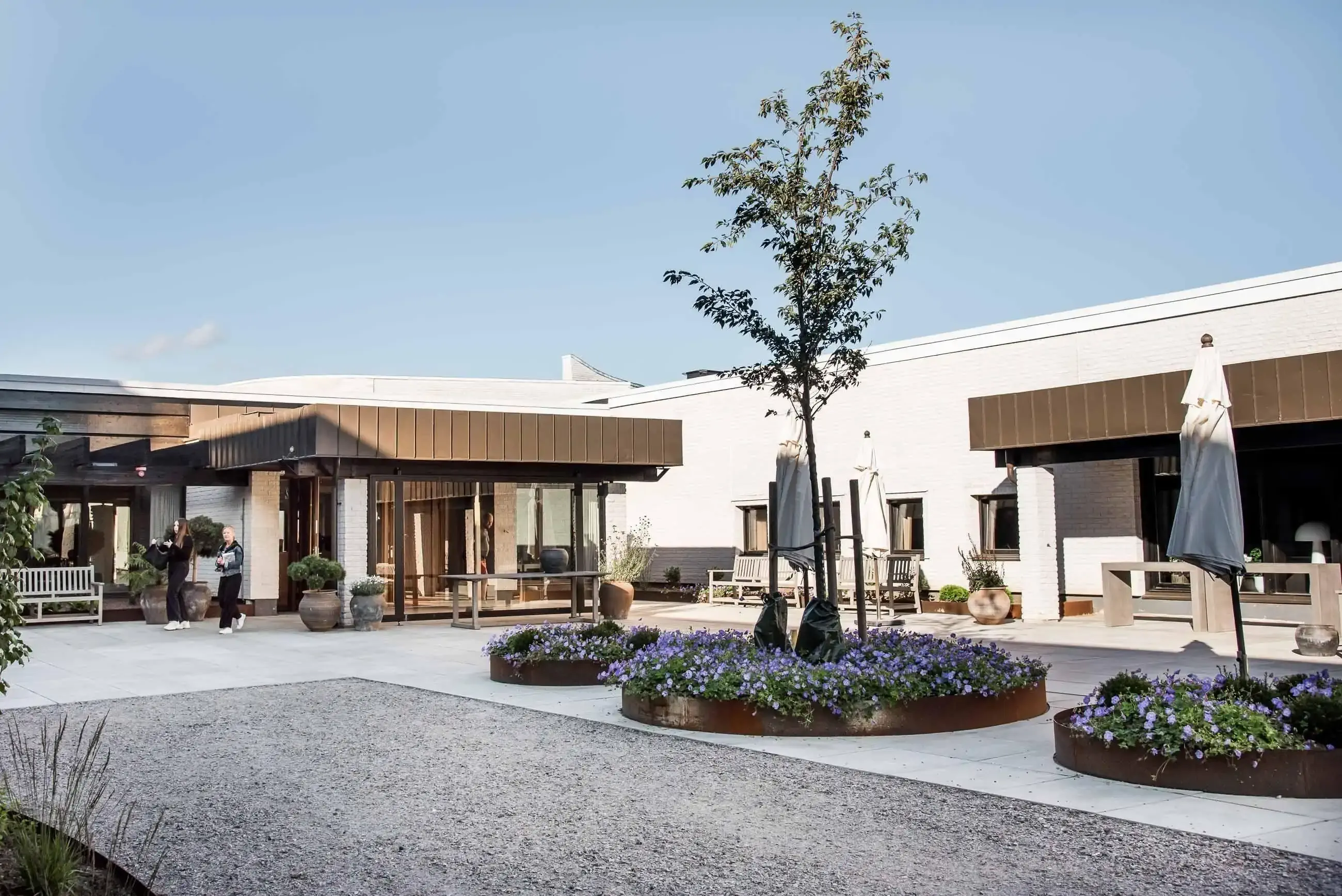 Exterior with garden view of modern Scandinavian hotel