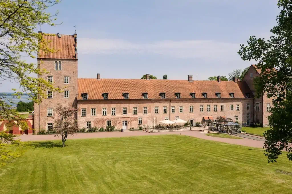 High angle view of old castle with large grounds in front